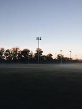 fog over a sports field 