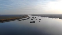Aerial View Of Floating Pontoons On Danube River At Sunrise.