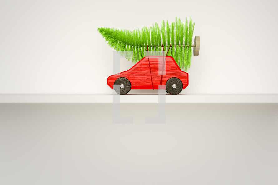 toy car with Christmas tree on its roof 