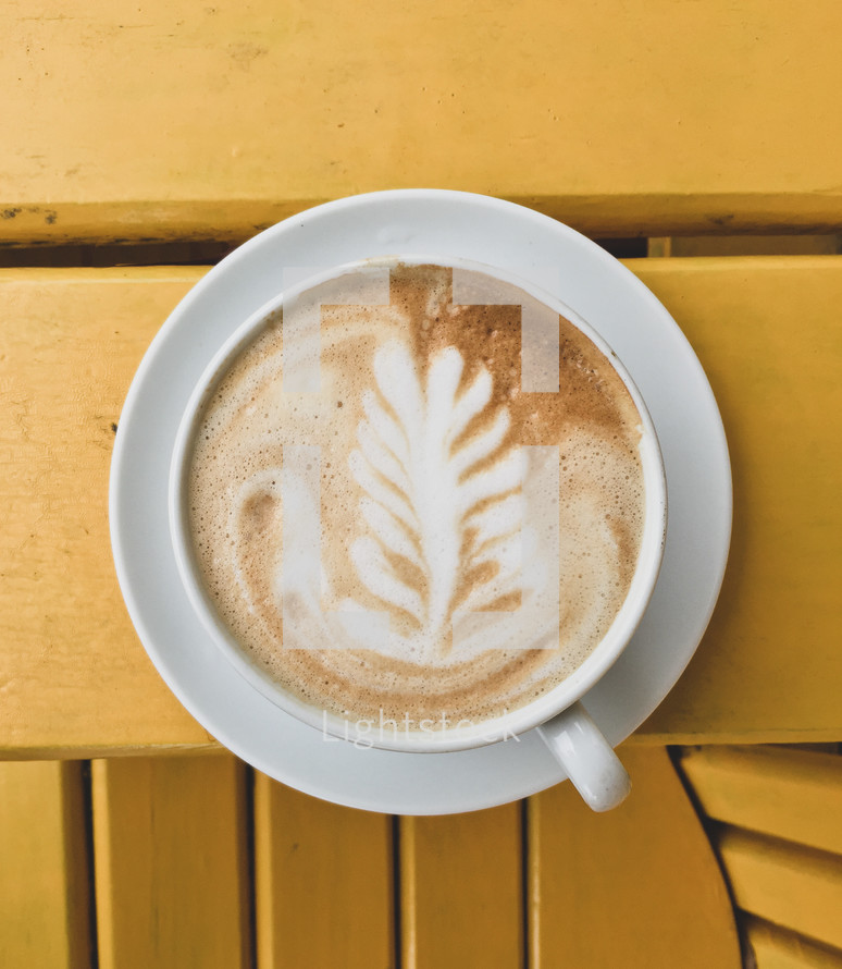leaf design in a coffee creamer 