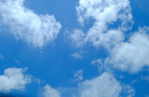white clouds in a blue sky 