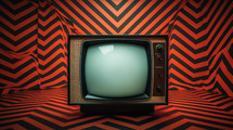 Hypnotic television with red background. 
