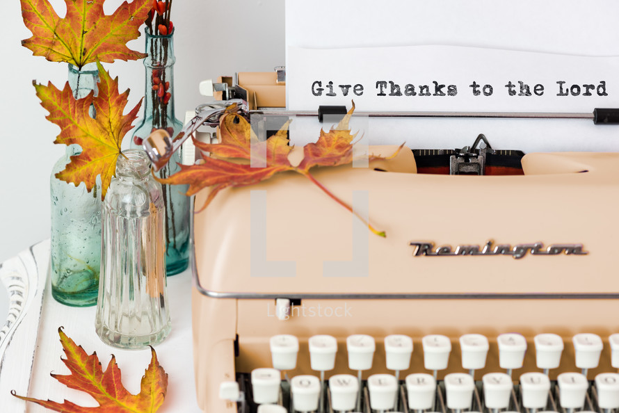 give thanks to the lord in type on a typewriter 