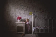 toddler in her nursery 