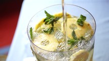mint and pineapple in fancy water 