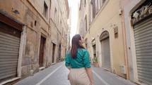 Portrait of Young Tourist woman exploring European town at Rome, Italy