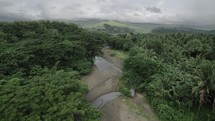 Drone Flying over Tropical Jungle River Asia Asian Philippines
