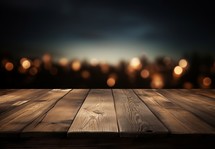 Wooden table in front of blurred city lights. Collage.