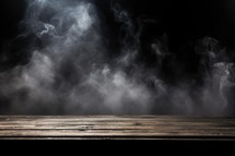 Empty wooden table with smoke on black background. Ready for product display montage