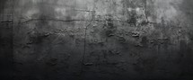 Dark grey concrete wall with scratches and cracks, panoramic background