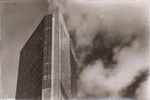smoke surrounding a high-rise 