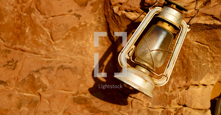 lantern on red rock in Jordan 