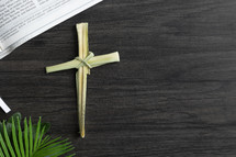 dried palm cross, bible and palms