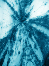 turquoise teal blue radial tie dye abstract suggests the shape of an angel with wings spread out