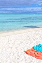 beach towels on the sand of a Polynesian beach 
