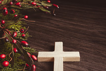 Christmas garland with berries and cross