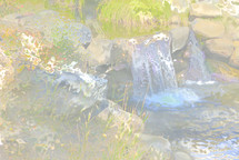 abstract waterfall by rocks and grasses with warm effect
