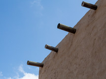 Wooden Poles On the Roof of an Ancient Middle Eastern House