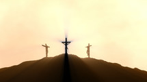 Silhouettes of three crosses with rays