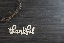 crown of thorns and thankful sign 