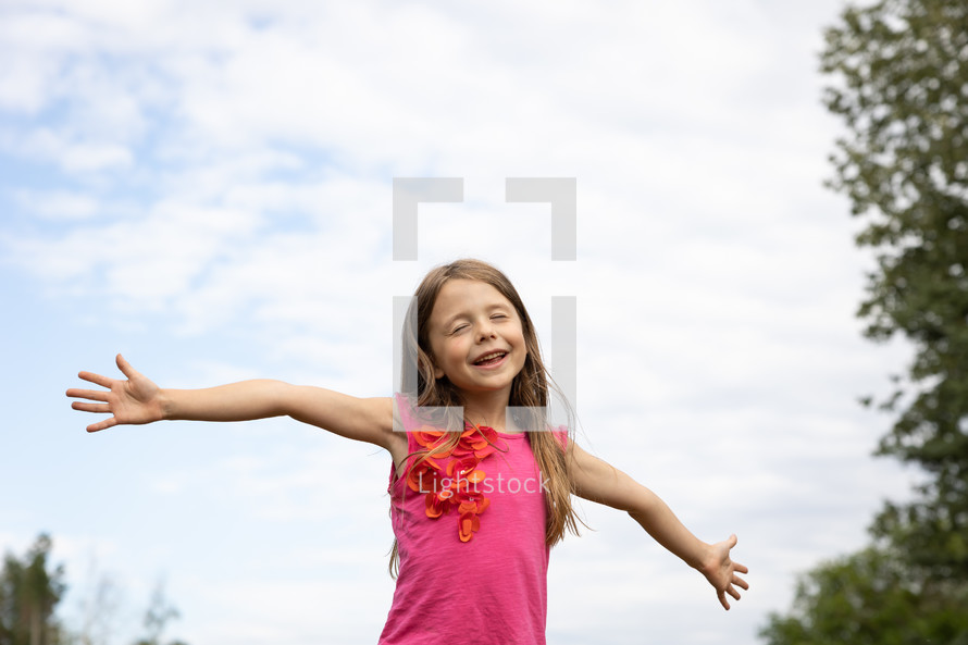 girl with outstretched arms 