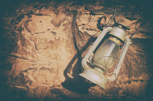 old fashioned lamp on rock 
