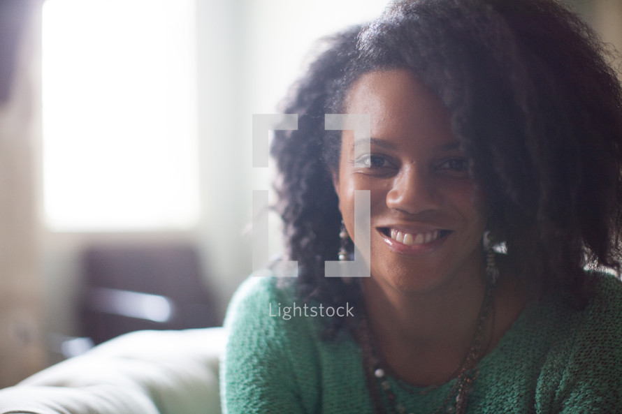 an African American woman smiling 