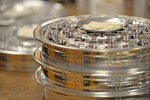 Silver communion trays.