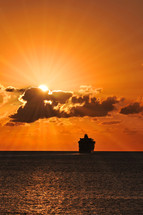 cruise ship at sunset 