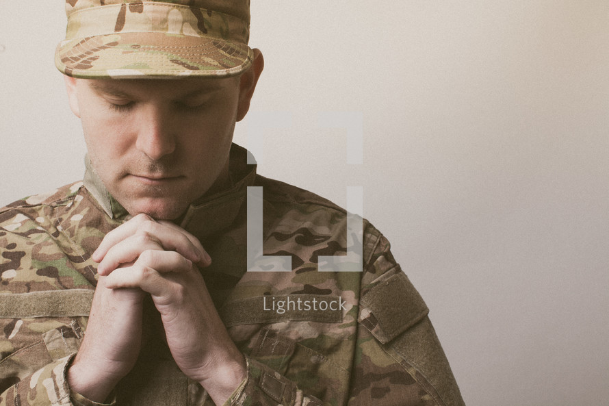 soldier in prayer