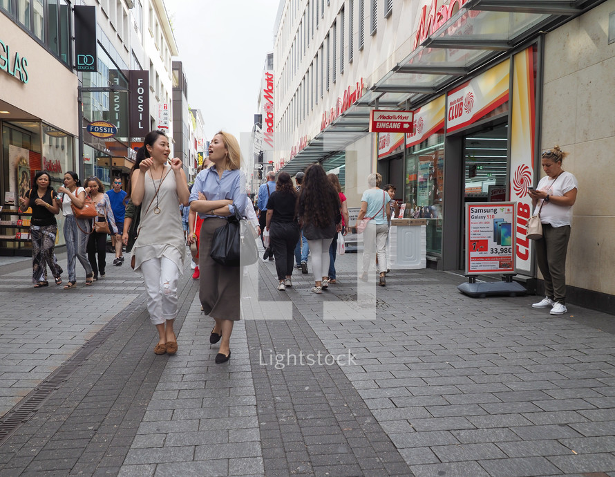 KOELN, GERMANY - CIRCA AUGUST 2019: People in Hohe Strasse (meaning High Street) shopping street