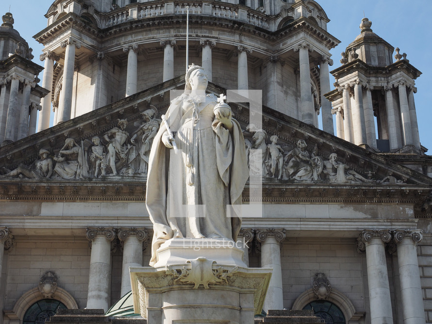 BELFAST, UK - CIRCA JUNE 2018: Queen Victoria statue in front of the Belfast City Hall