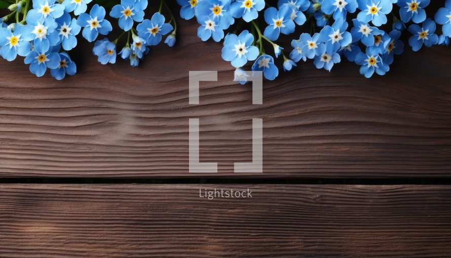 flowers on wooden background. Spring background