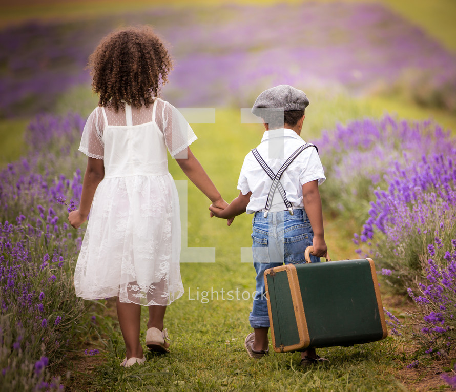 brother and sister portrait in a lavender field 