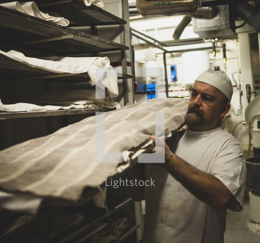 man working in a commercial kitchen 
