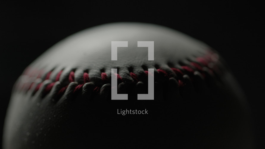 Dramatic, cinematic macro texture shots of a baseball