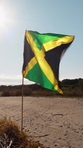 Jamaica Flag Waving On Hut On The Beach