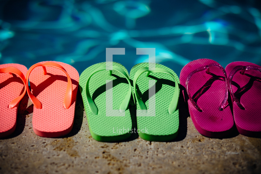 flip-flops by a pool