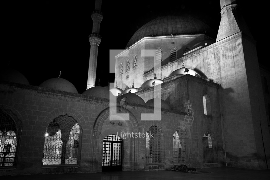 Mosque at night with full moon