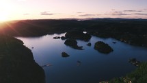 aerial view over a lake at sunset 