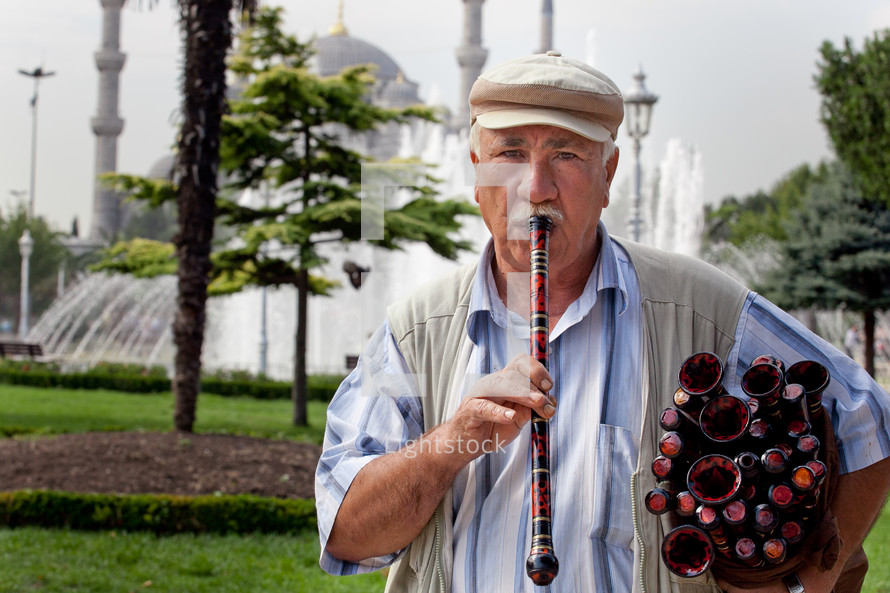 Turkish man with flutes