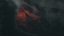 Drone aerial of lava flowing from Pacaya volcano in Guatemala.