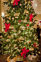 christmas tree with gold ornaments