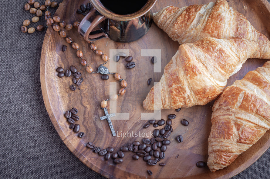 rosary, coffee and croissants 