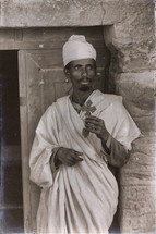 Ethiopian priest holding a cross 