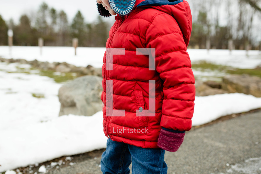 a child in a winter coat 