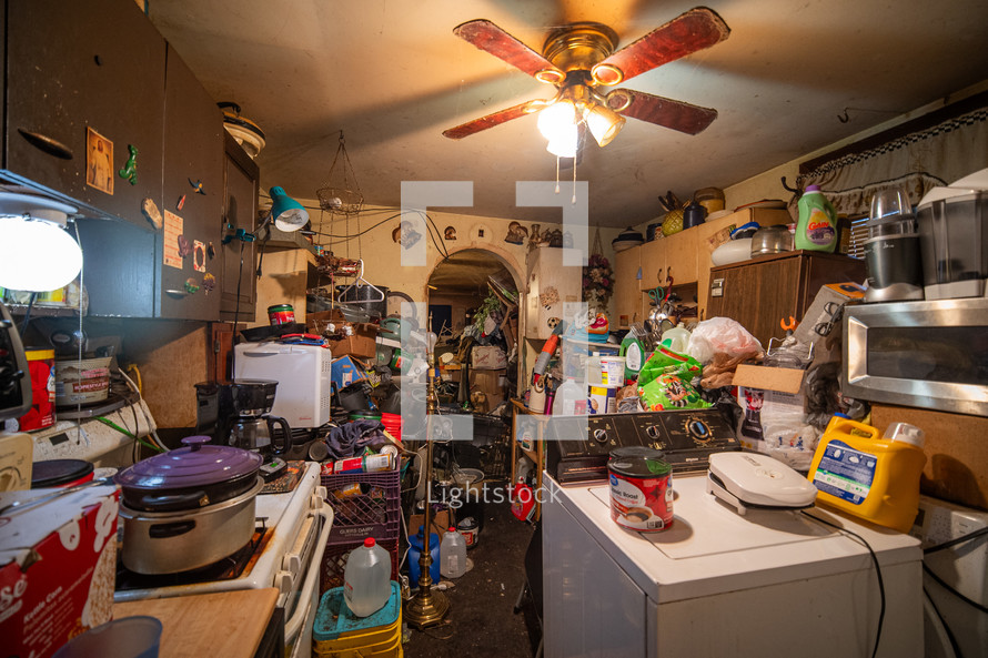 Hoarder's home, piles of things, messy consumerism. 