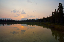 sunset reflecting on a lake