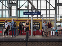 BERLIN, GERMANY - CIRCA JUNE 2019: People in Alexanderplatz station