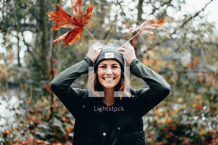 portrait of a woman standing outdoors in fall 